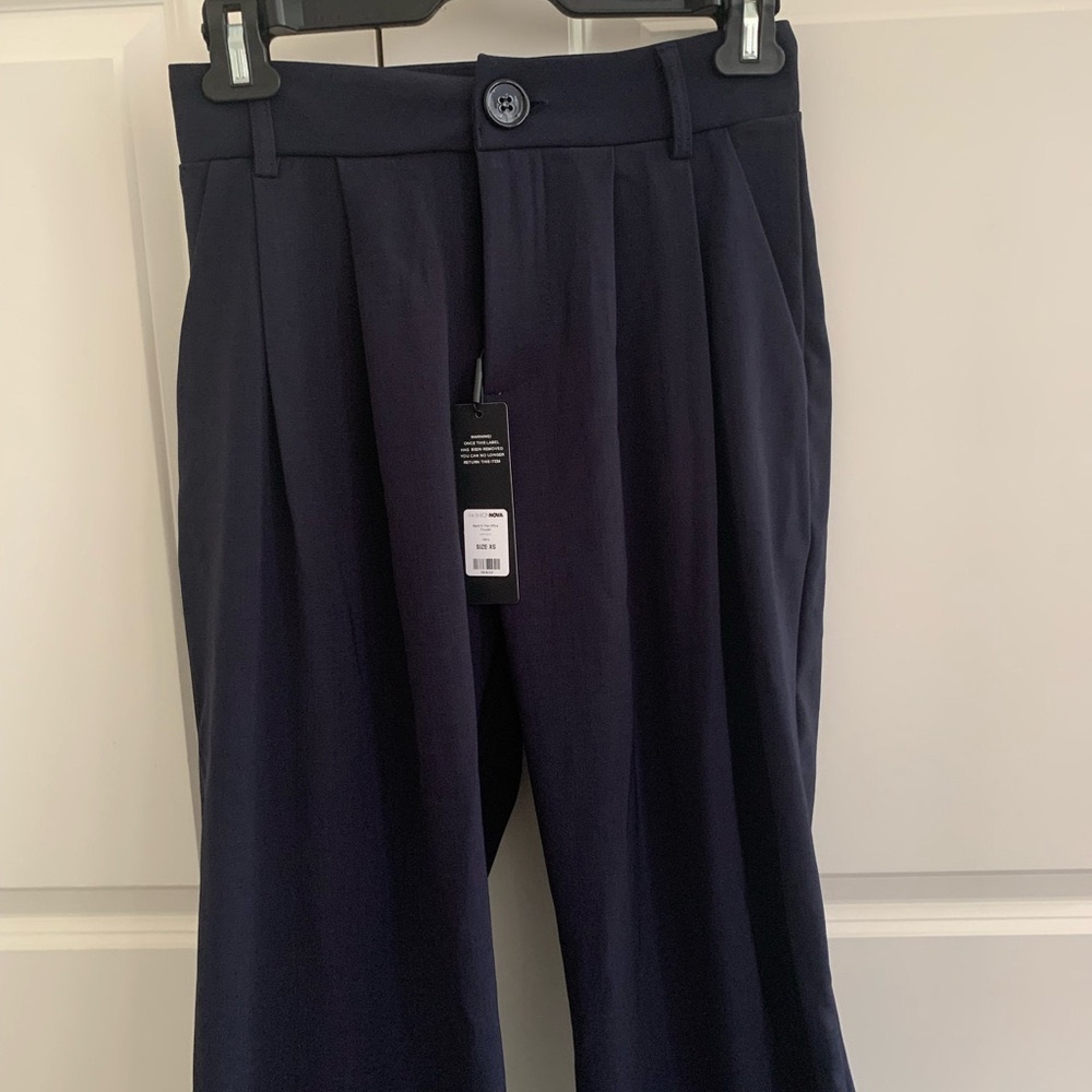 Navy blue pleated trousers
